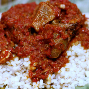 OFADA RICE WITH SAUCE / PLANTAIN